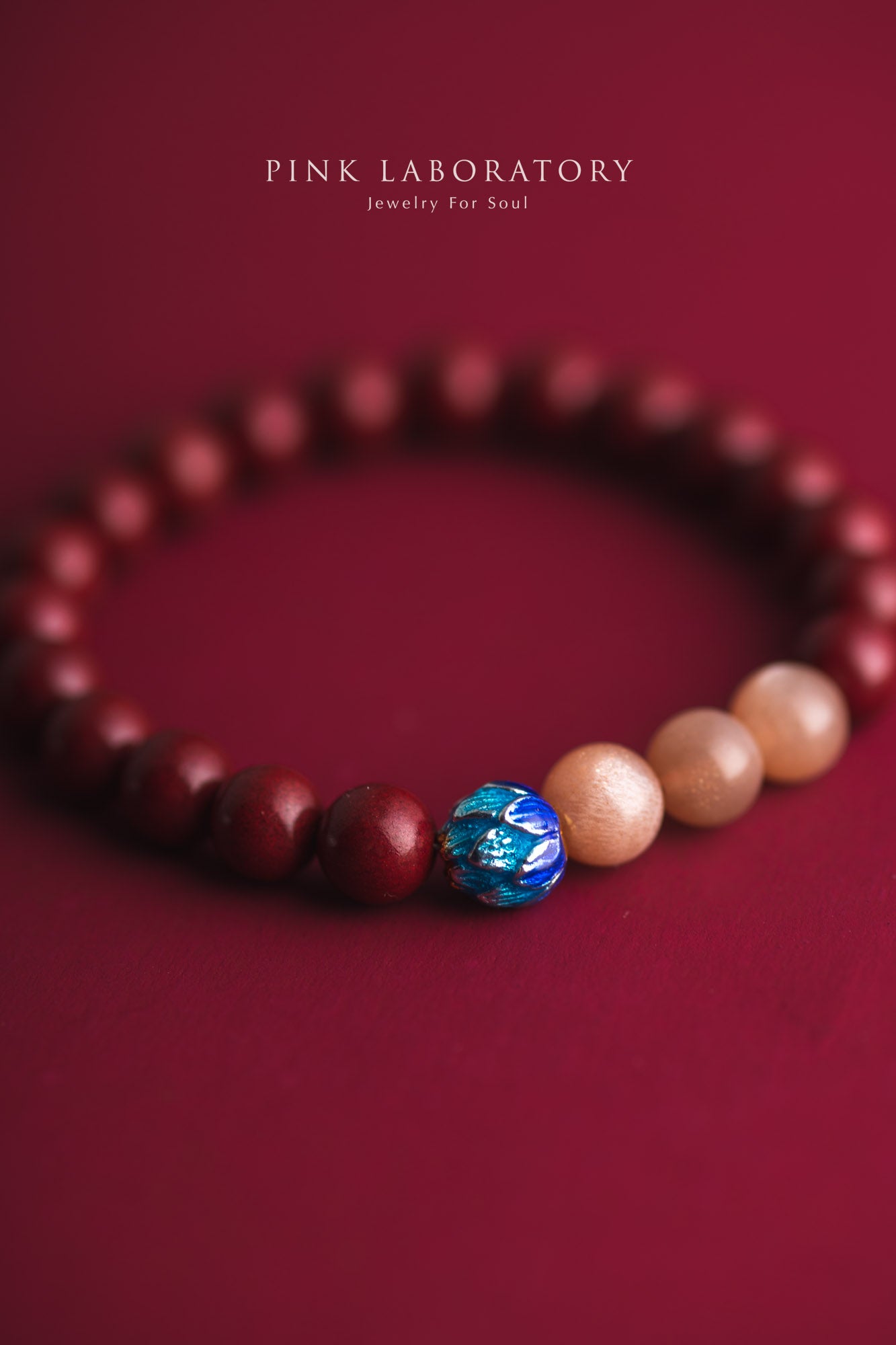 硃砂橙月光石925純銀手鍊 8mm