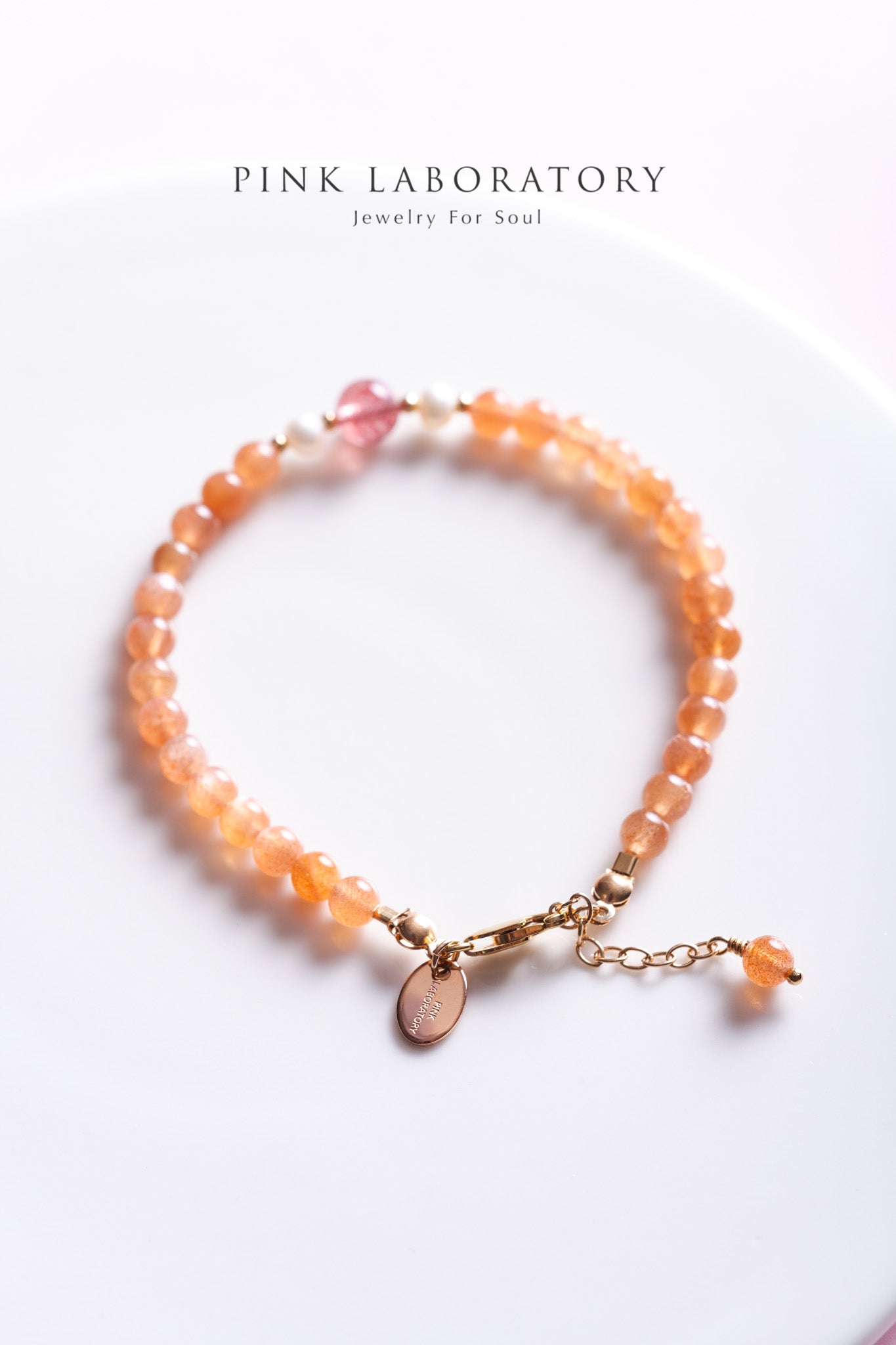 橙月光石草莓晶14k包金手鍊