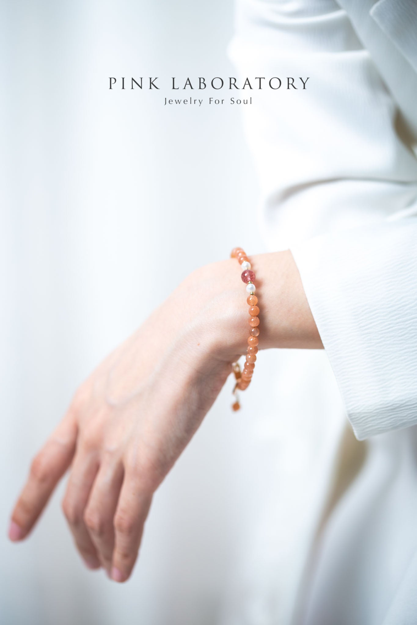 橙月光石草莓晶14k包金手鍊